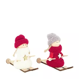 Strickfiguren auf Ski