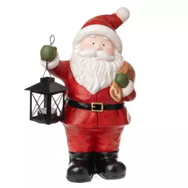 Santa stehend mit Metall-Laterne